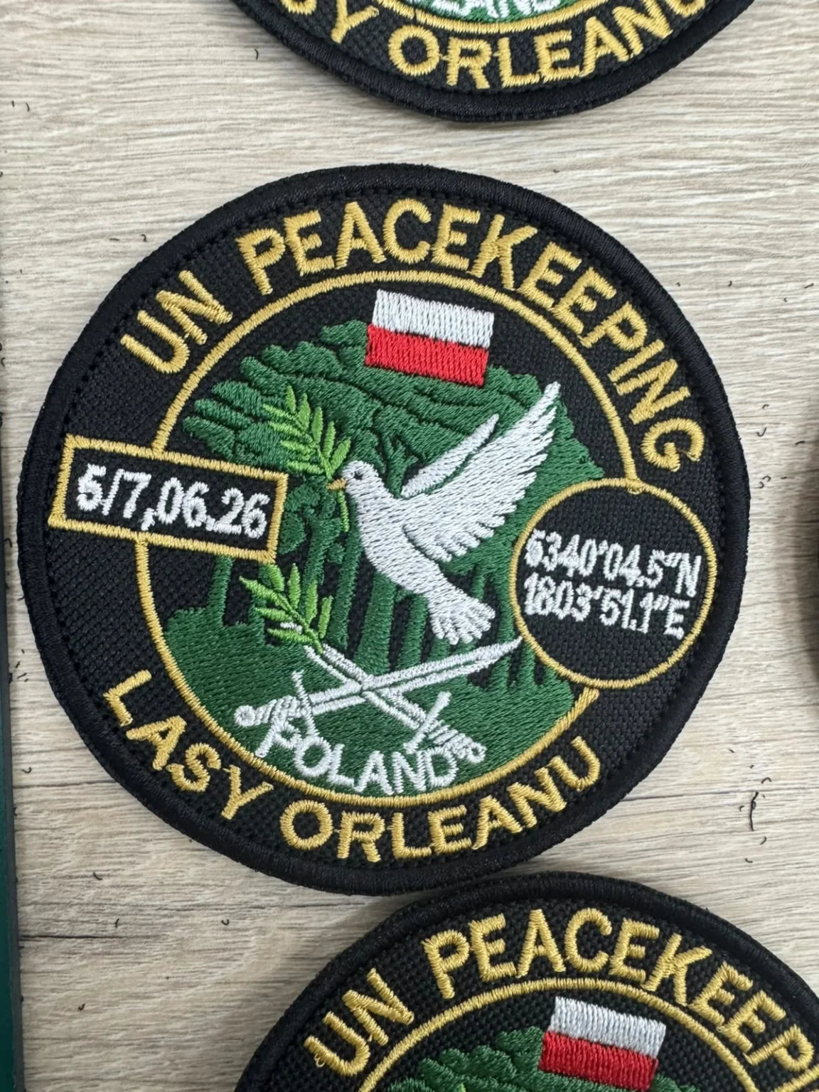 Okrągłe naszywki UN Peacekeeping z motywem orła
